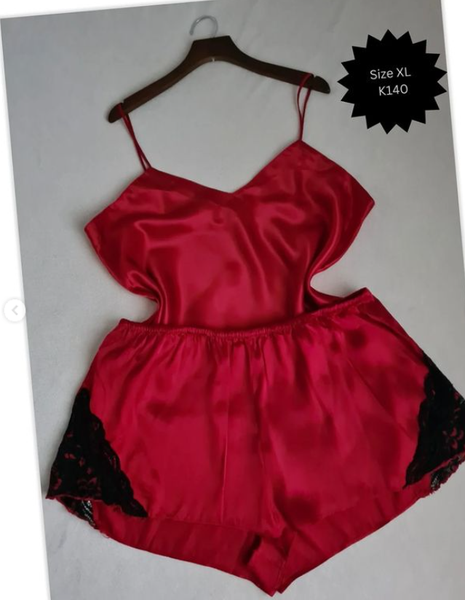 T-shirt and shorts are red