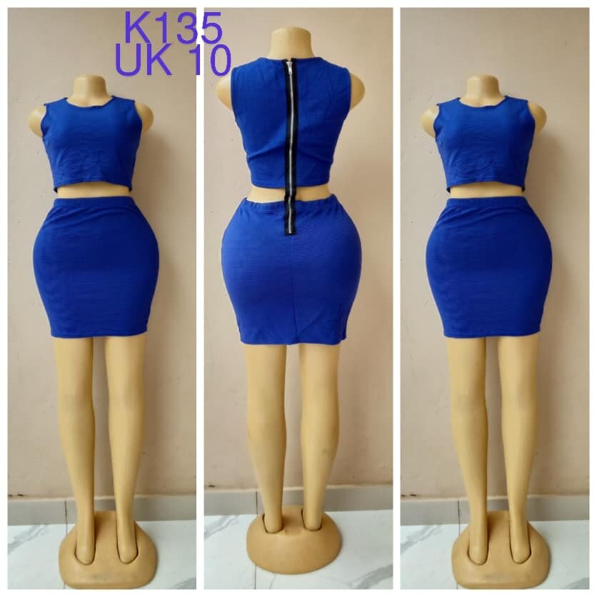 Blue dress with a slit at the waist, size 10
