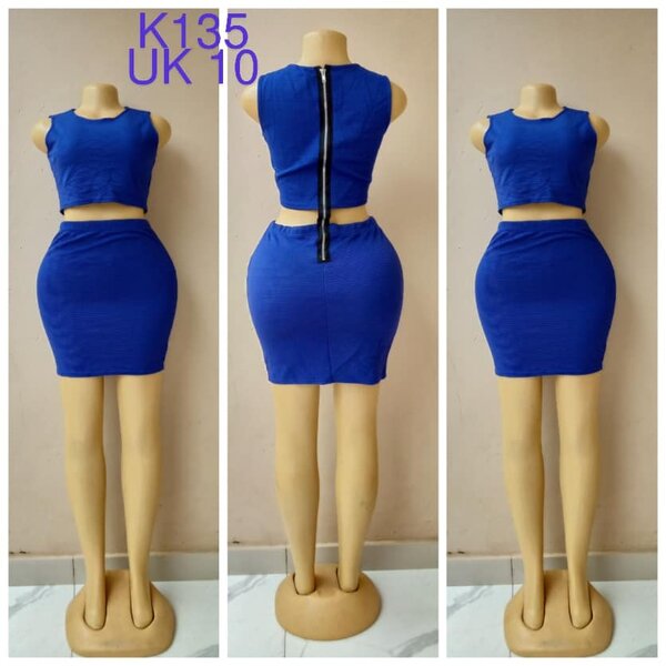 Blue dress with a slit at the waist, size 10