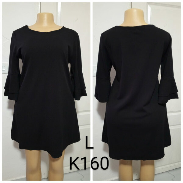 Women's dress is black, size L
