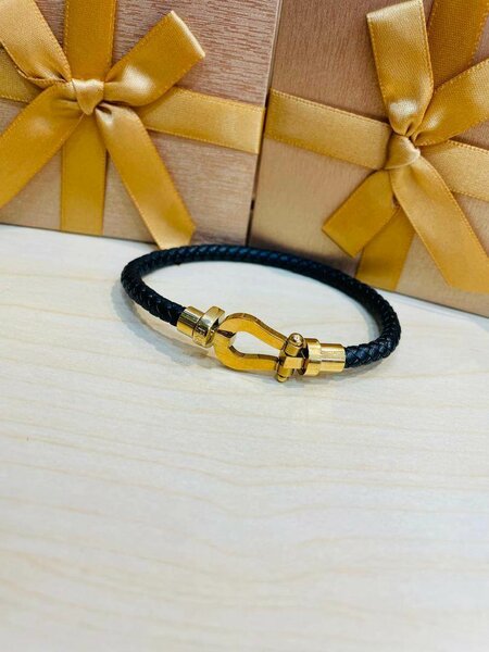 Bracelet en cuir tressé or