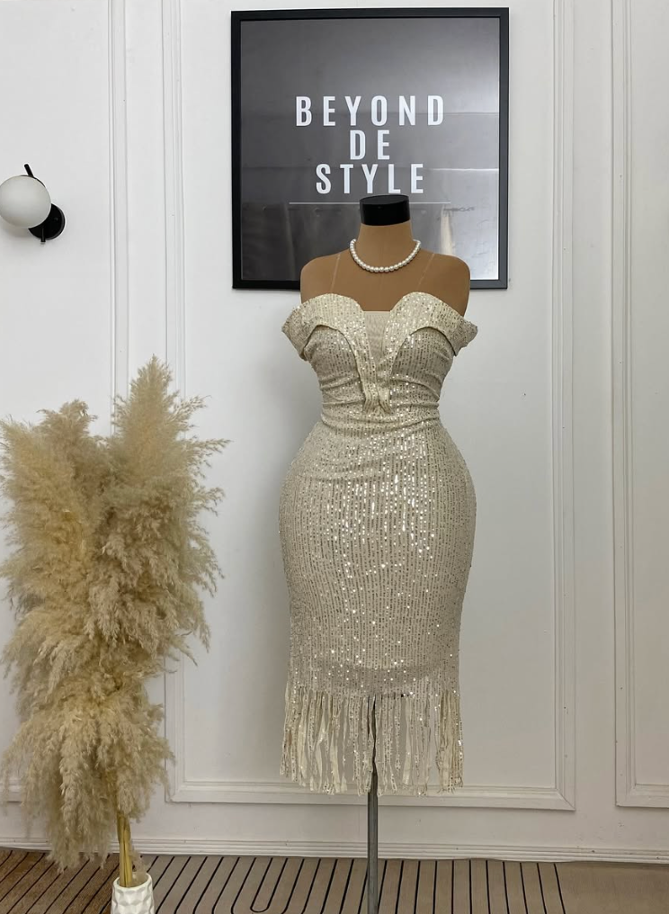 ICONIC SEQUIN FRILL DETAIL DRESS.