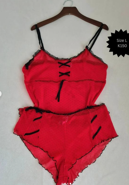 T-shirt and shorts are red