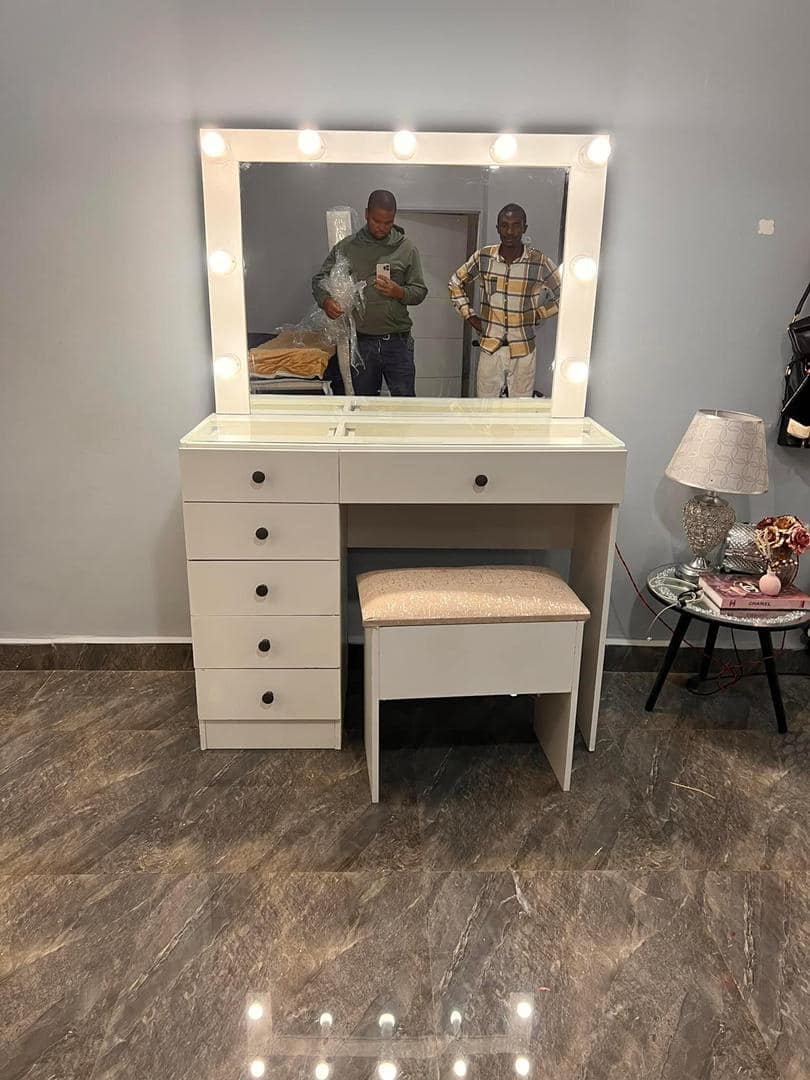 beige makeup table with mirror