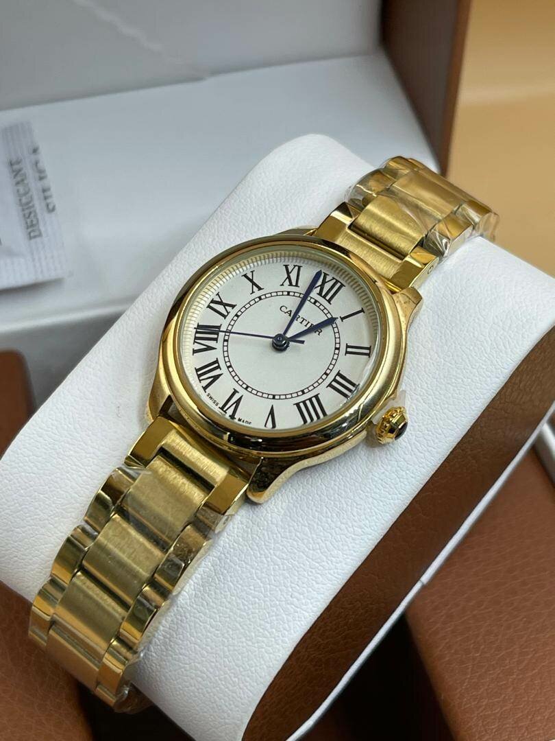 Montre  FEMME  ROLEX / CARTIER
