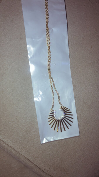 Collier pendentif soleil doré