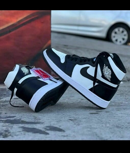 Sneakers en cuir noir et blanc