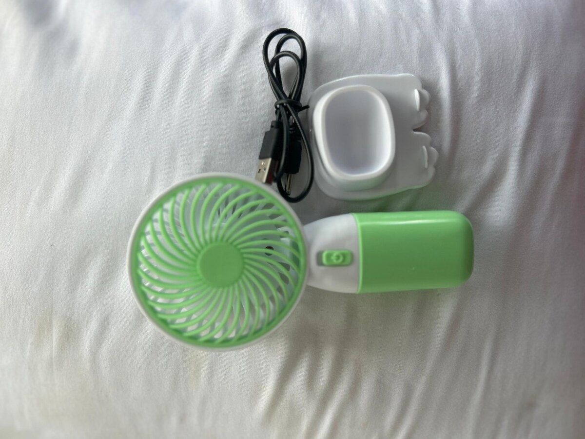 Portable hand fan
