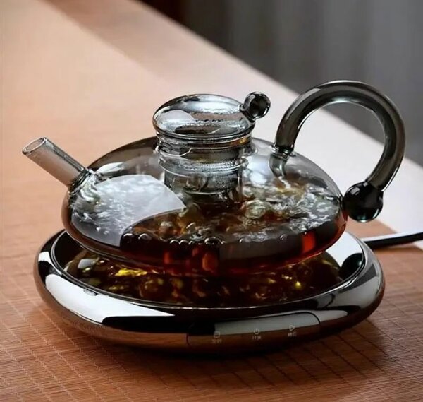 Théière en verre avec tasses