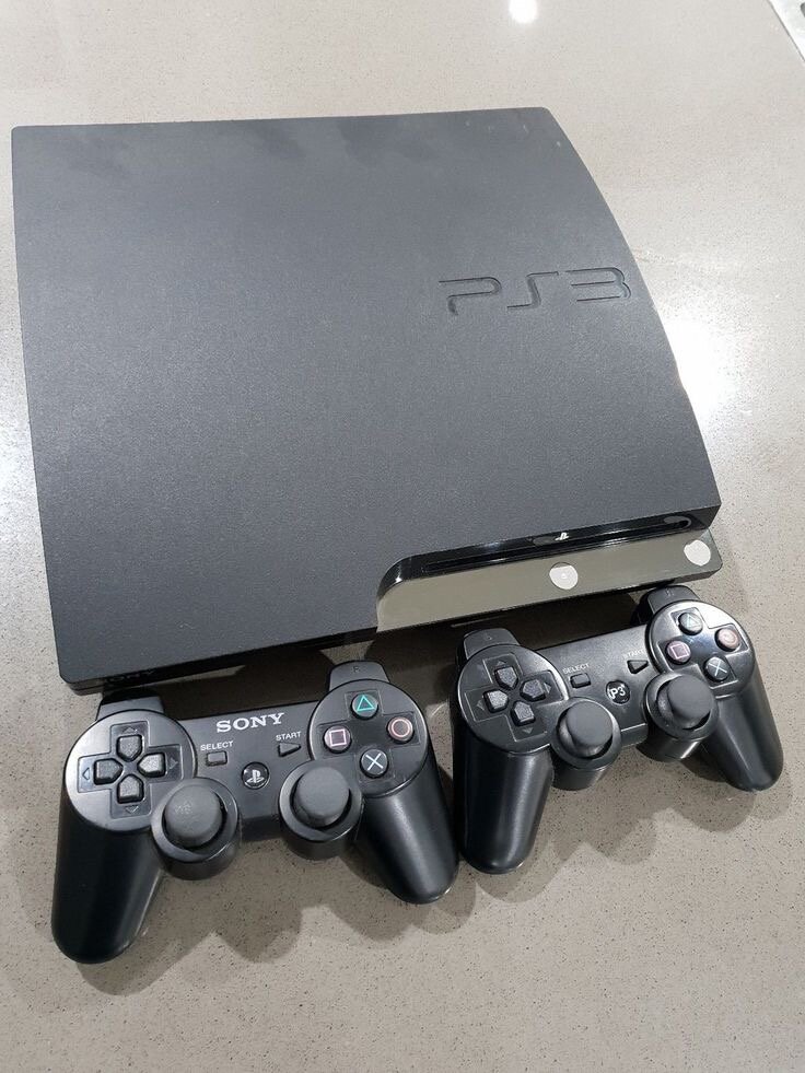 Console PS3 avec  2 Manette