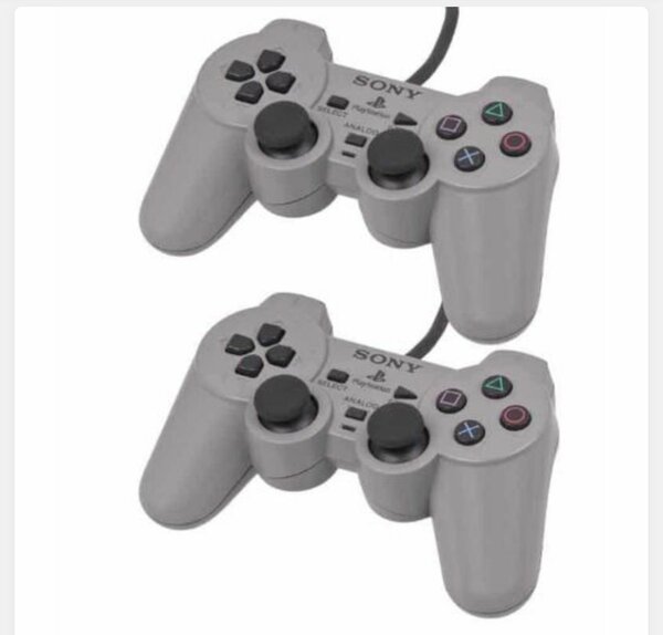 LOT DE 2 MANETTES PS2 GRIS