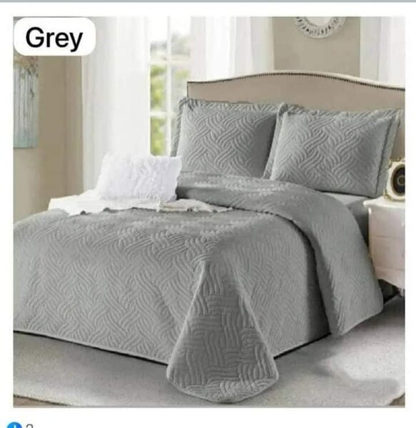 2 continental pillow cases, 2 standards pillow cases and 1 bedspread  grey