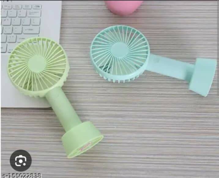 Stay Cool with a Portable hand Fan    Compact design  Powerf