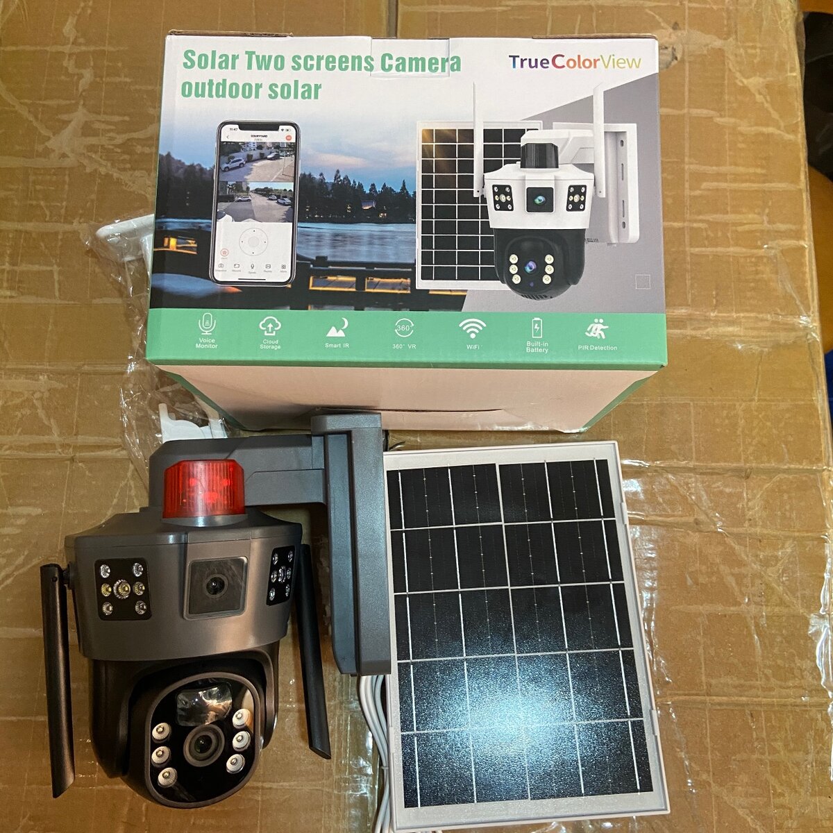 Dual lens solar powered security camera