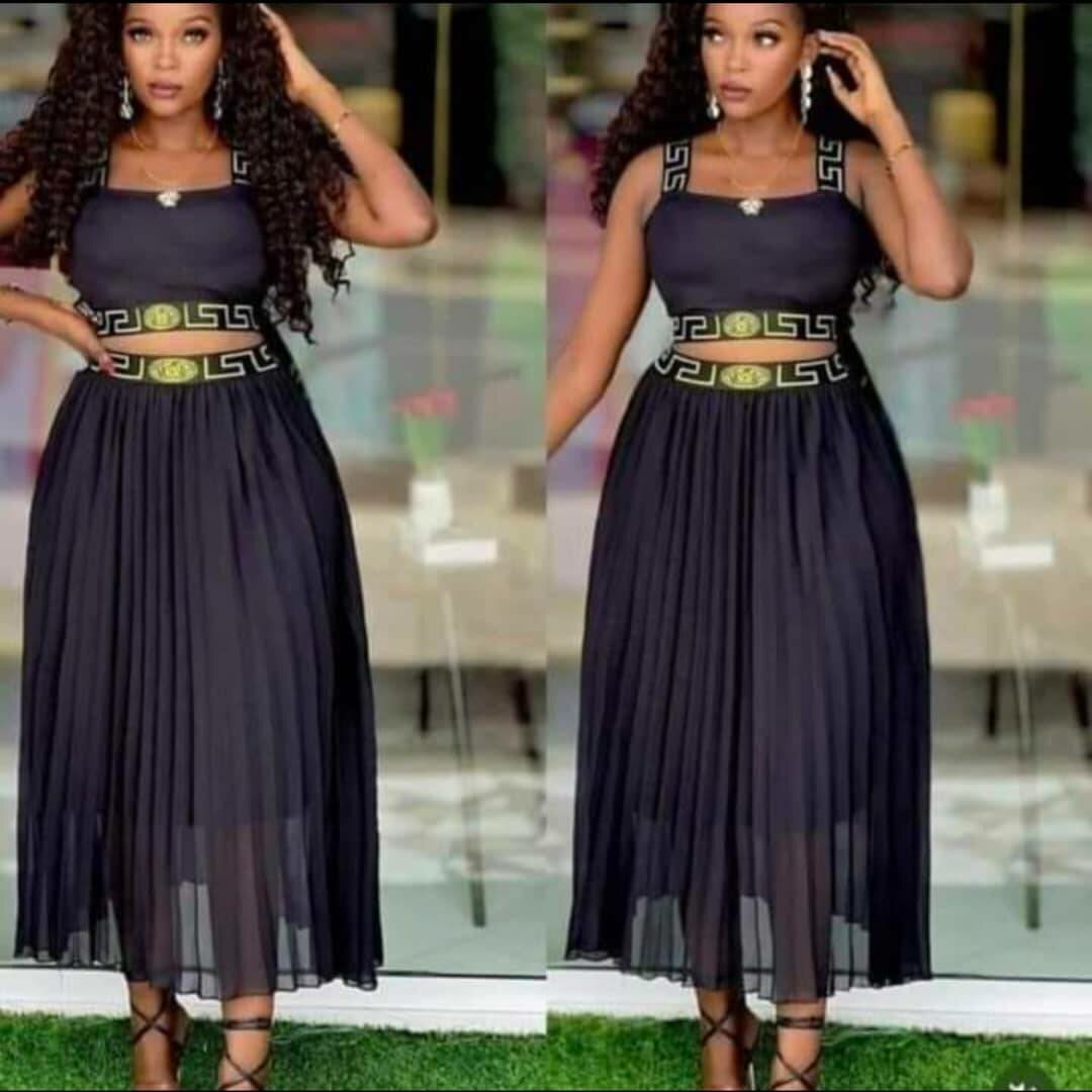 Black festive dress with pleated transparent skirt