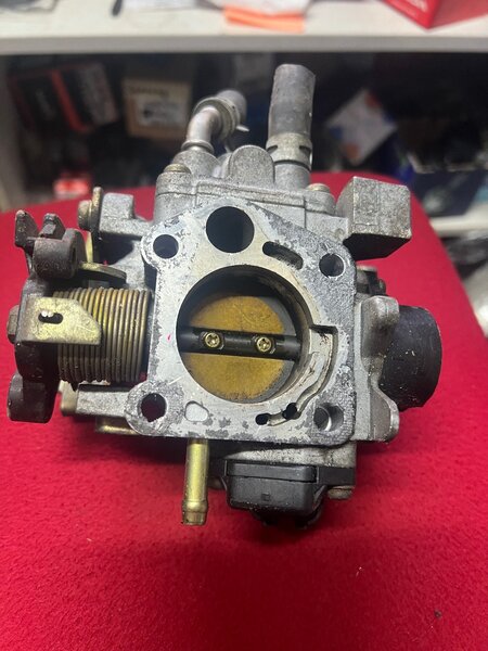 Дросленный заслонка