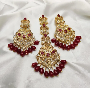 Casting Fine Quality Ganga Jamni bindiya and Earrings