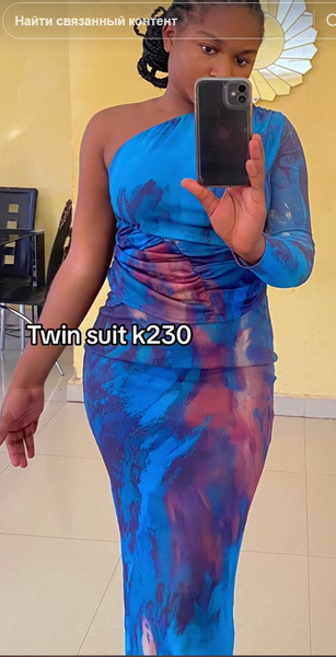 Women's suit, long skirt and top with one sleeve