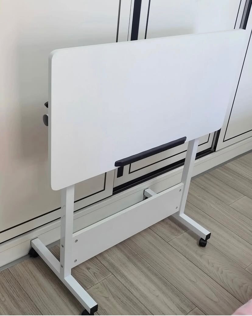 ROTATORY ADJUSTABLE TABLE