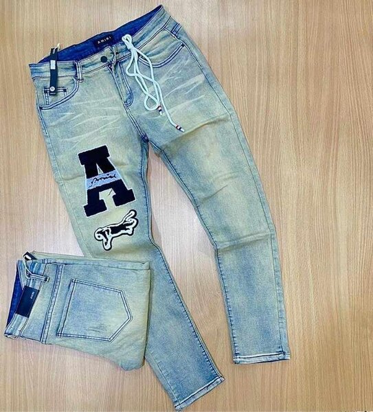 Jeans homme slim délavé avec lettrage