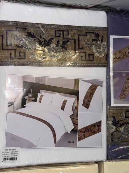 Parure de lit brodée luxe