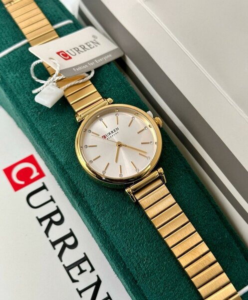 Montre élégante dorée CURREN