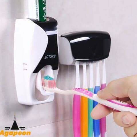 Toothbrushes + toothpaste dispenser