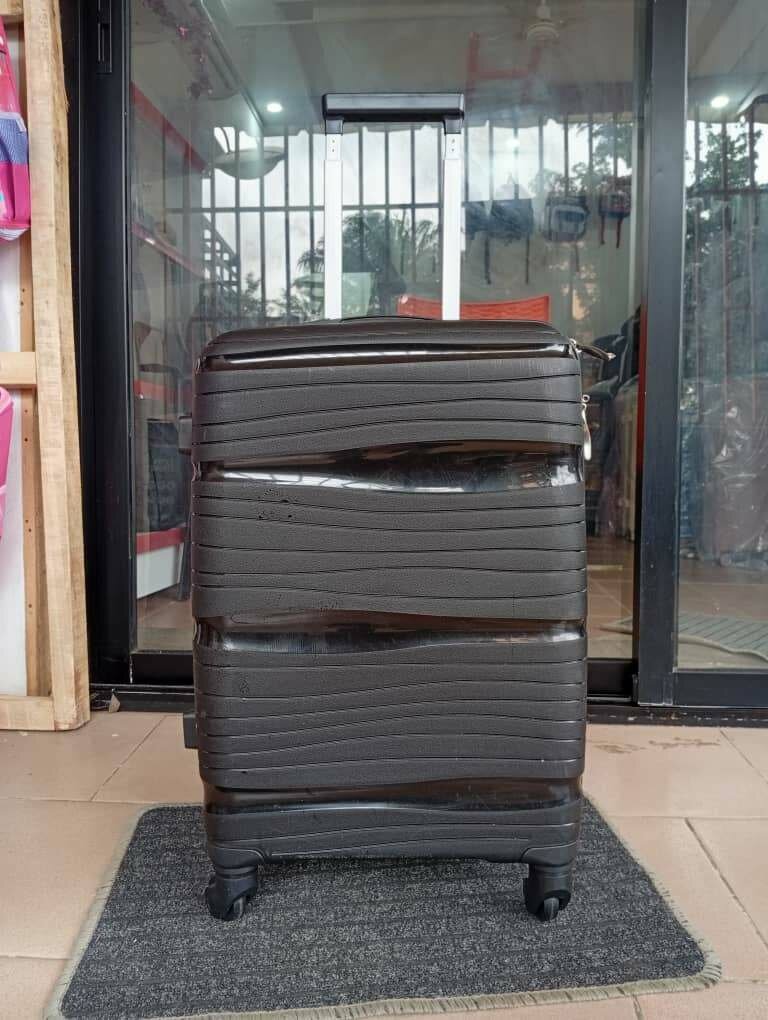 Valise à roulettes rigide