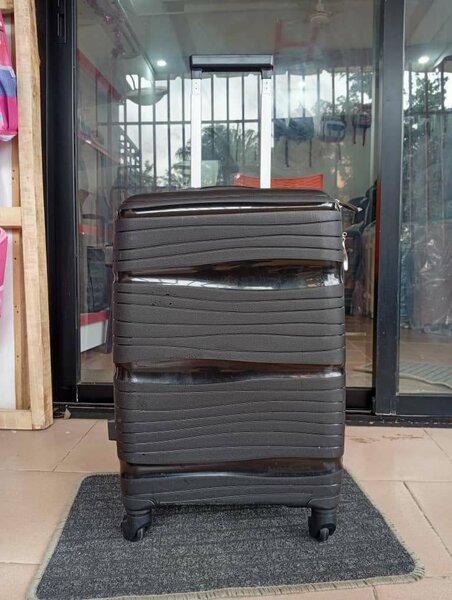 Valise à roulettes rigide