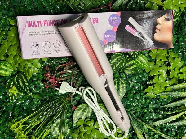 Fer à boucler multifonction