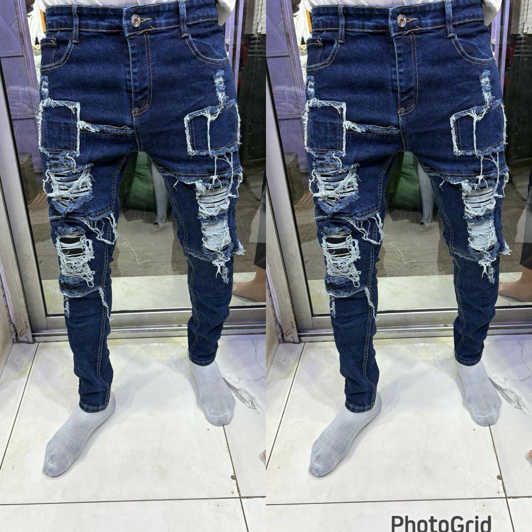 Jeans déchirés tendance homme
