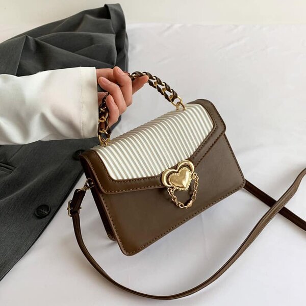 High-quality, stylish women's bag decorated with a heart