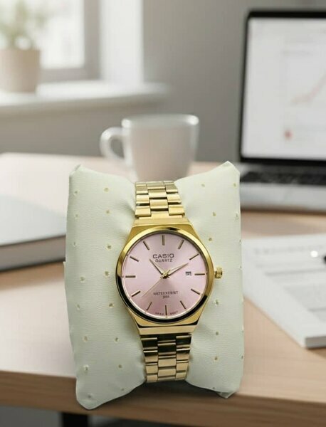 Montre Casio dorée (cadran rose)