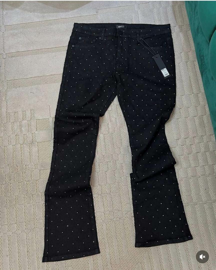 Pantalon évasé noir à pois