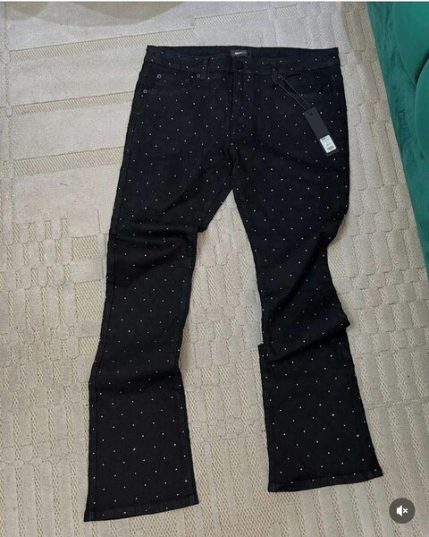Pantalon évasé noir à pois