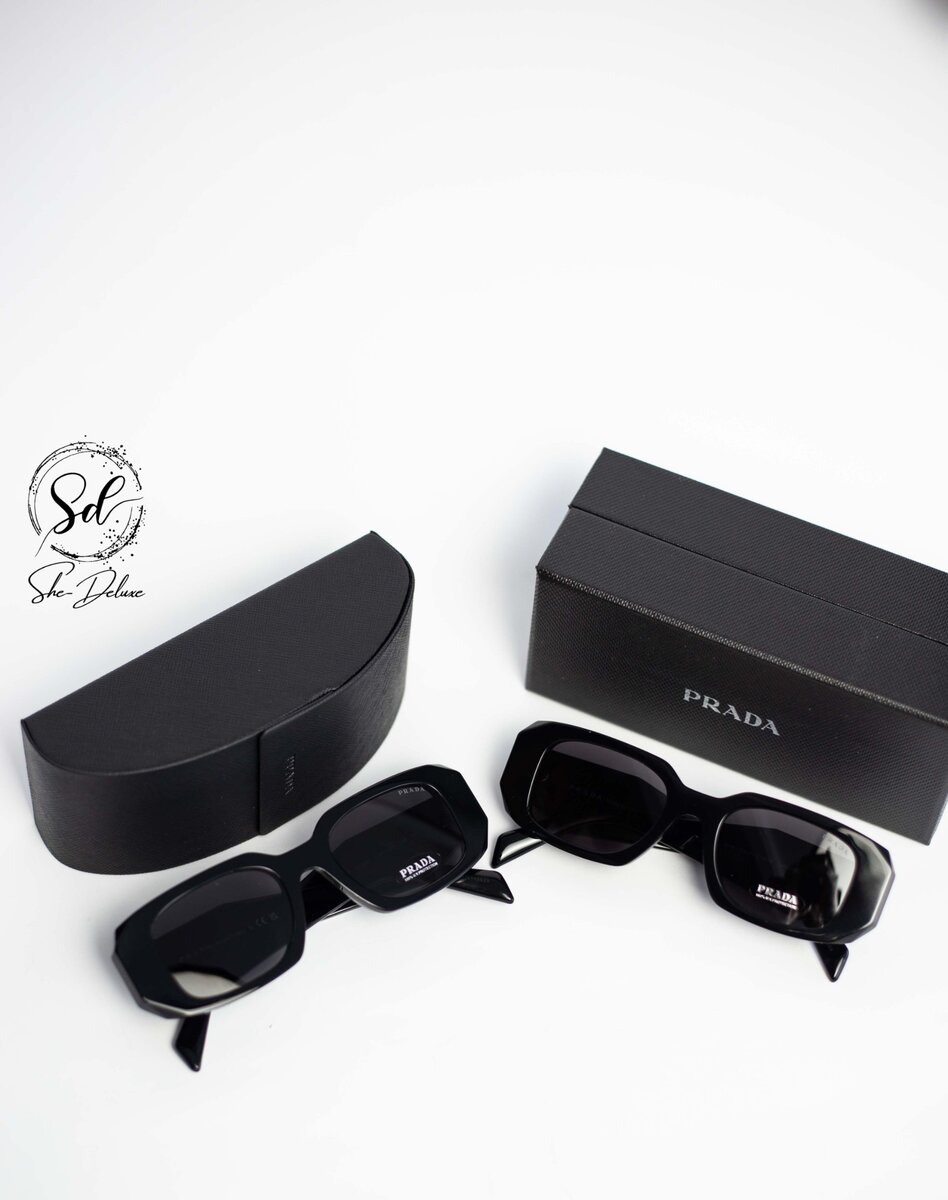 PRADA ASYMMETRIC ARM SUNGLASSES