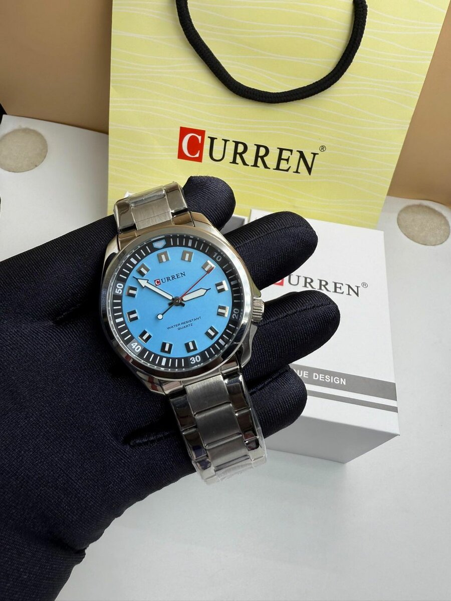 Montre curren stylé fond bleu