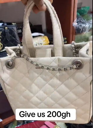 Elegant women's bag with a square shape in white color