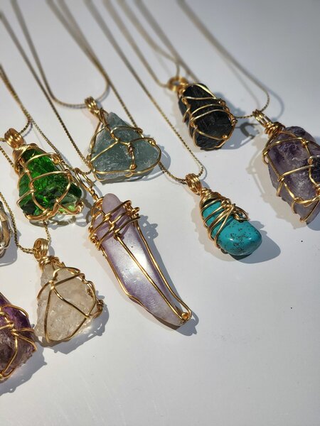 CRYSTAL STONE NECKLACES.