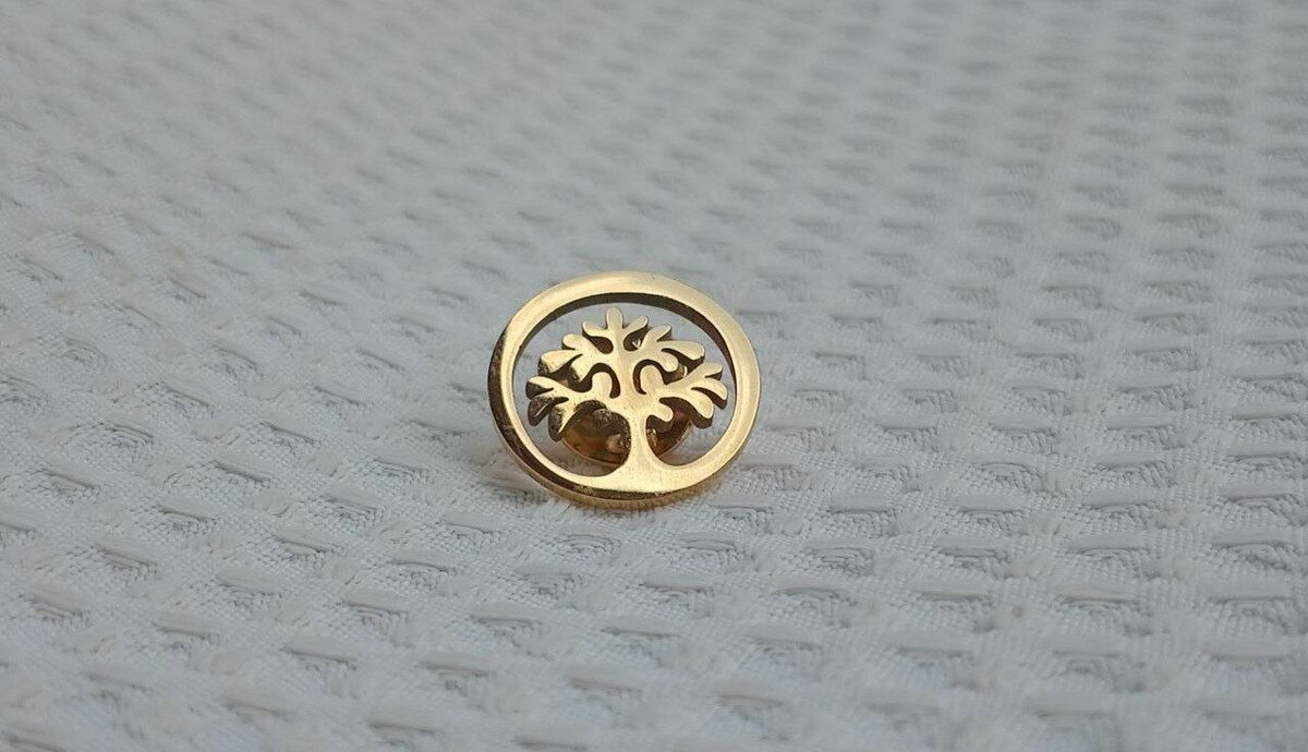 Timberland lapel pin