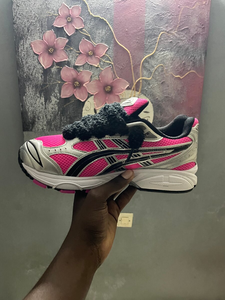 Chaussures de course roses élégantes