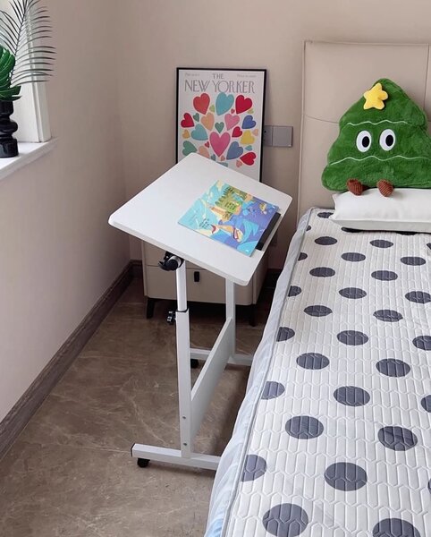 ROTATORY ADJUSTABLE TABLE