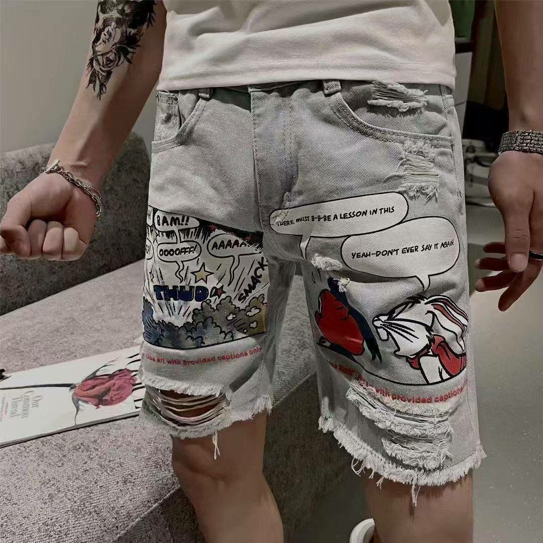 Shorts en jean avec motifs BD