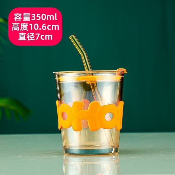 Glass cup with straw