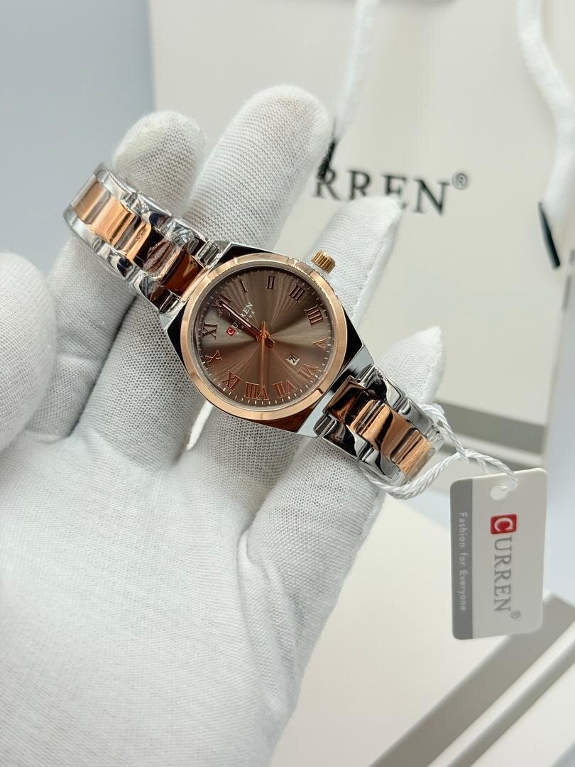 Montre femme élégante bicolore