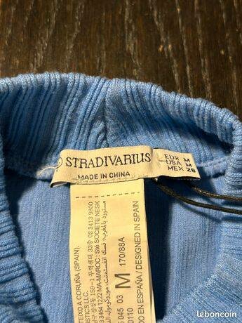 Pull court en maille côtelée