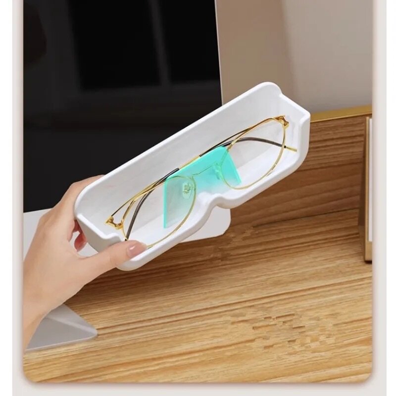 Support adhésif mural pour les lunettes de soleil