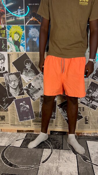 Shorts de plage orange vif