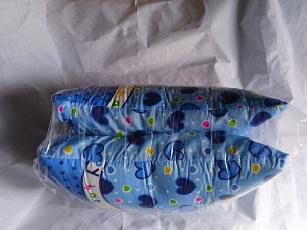 Coussin décoratif bleu coeur