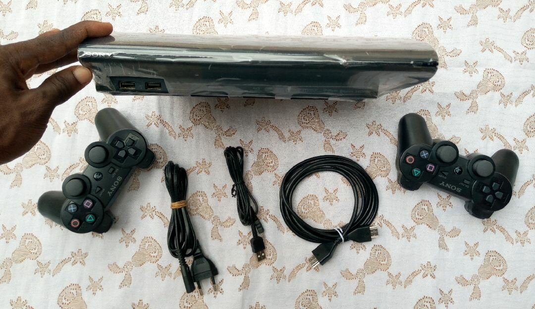 PS3 Ultra slim craquée 20 jeux